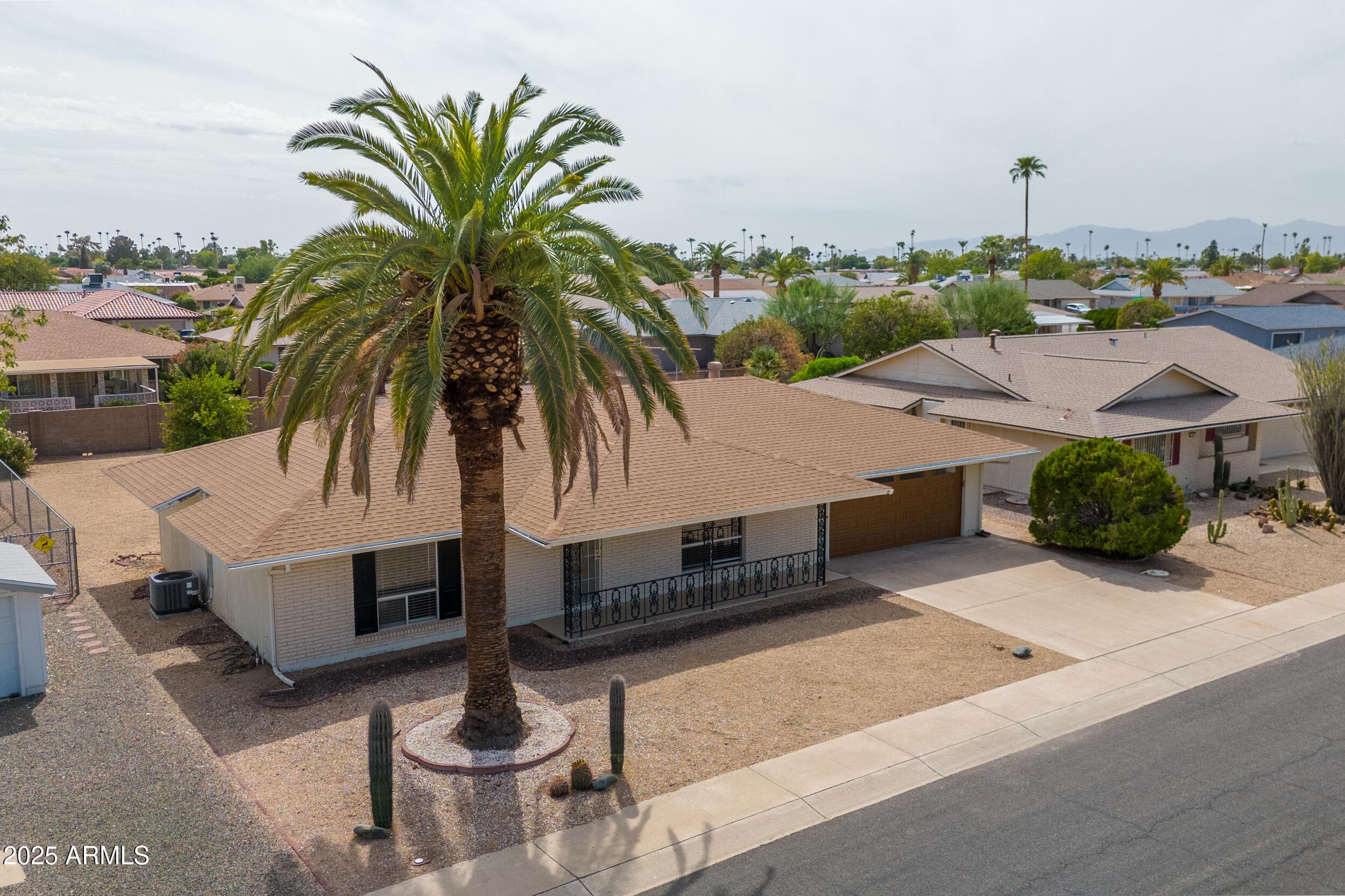 10301 W Charter Oak Dr — photo 2