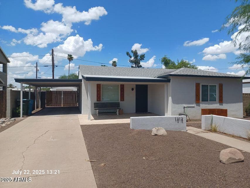 1312 W Roma Ave — photo 1