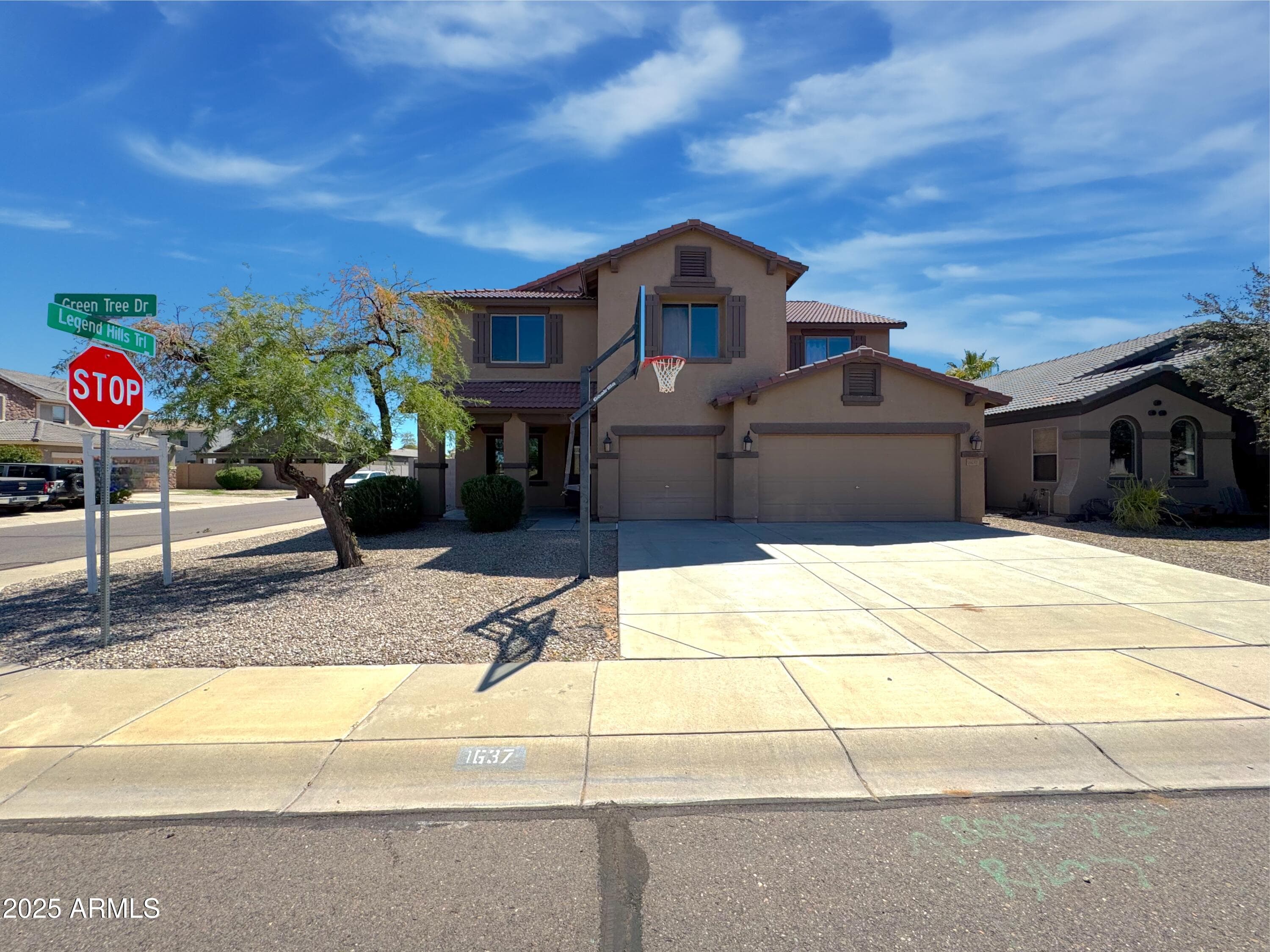 1637 W Green Tree Dr — photo 1