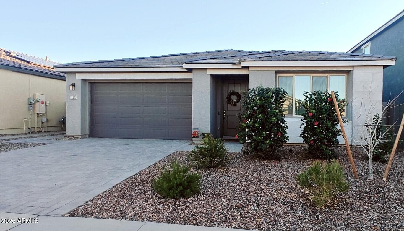 11253 E Ulysses Ave — photo 1