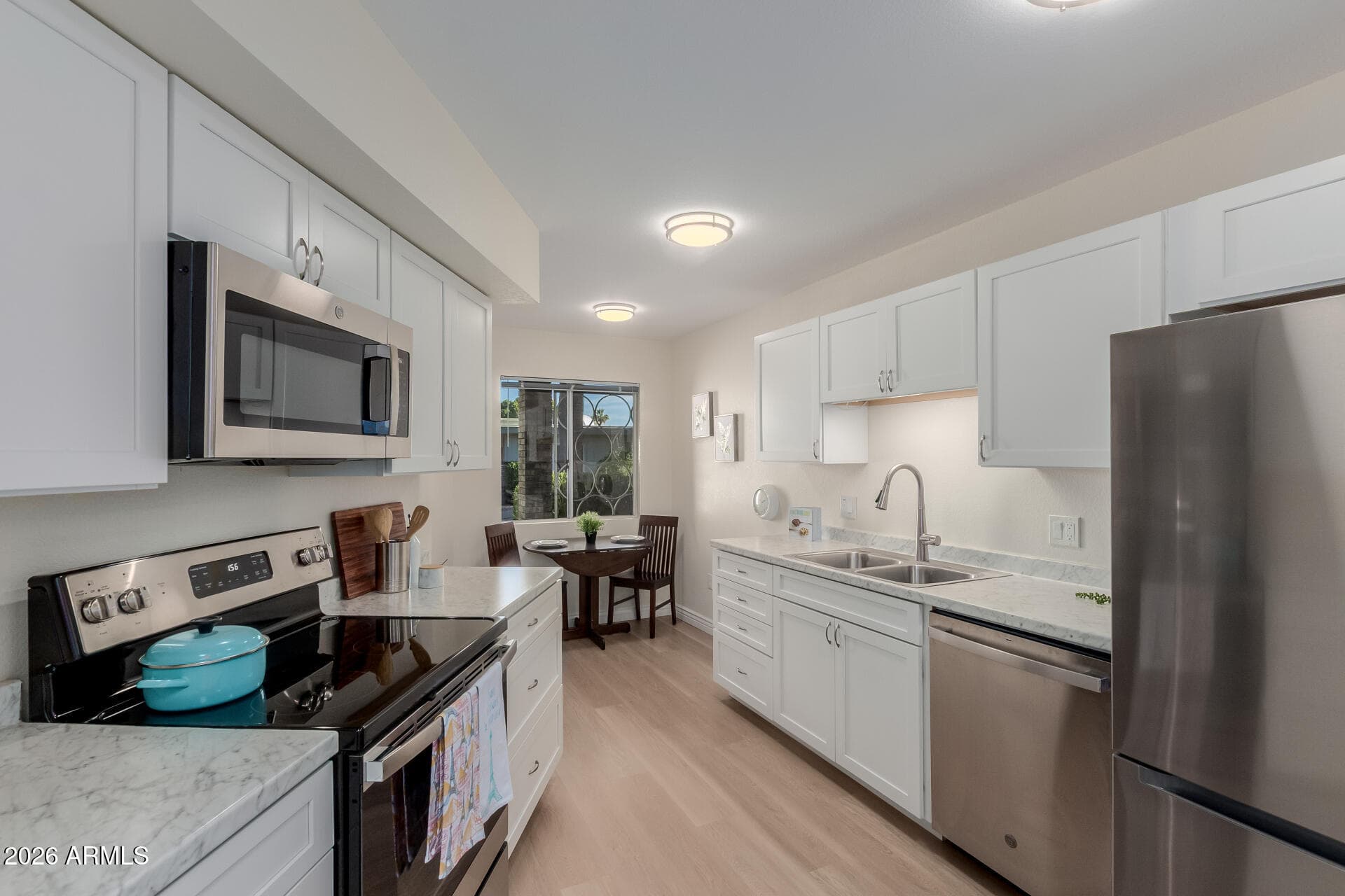 10943 W Coggins Dr — photo 2