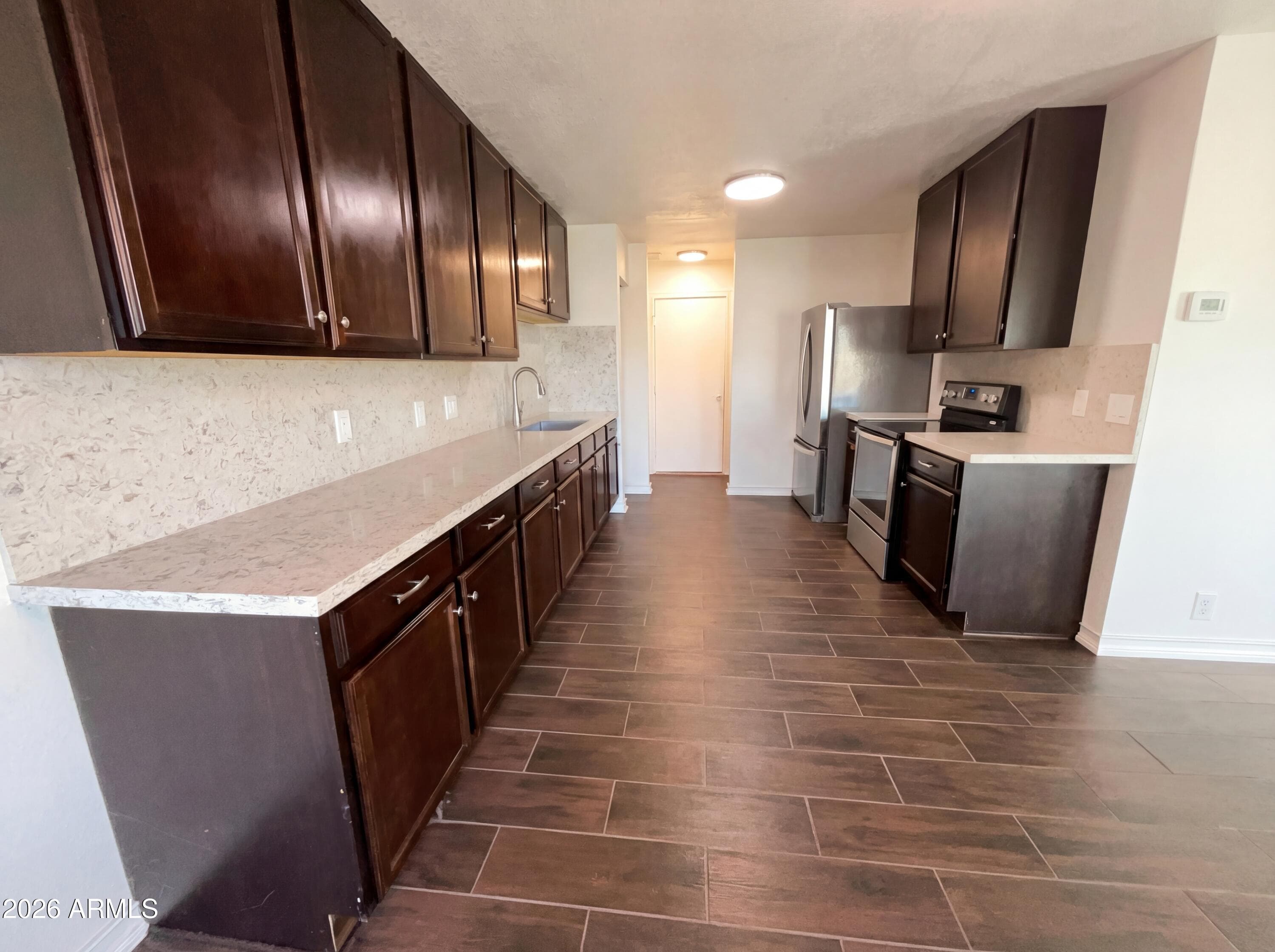 10002 N 66th Ln — photo 2