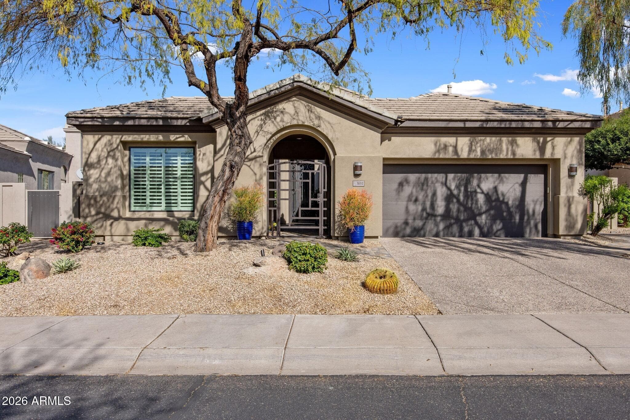 7692 E Whistling Wind Way — photo 1