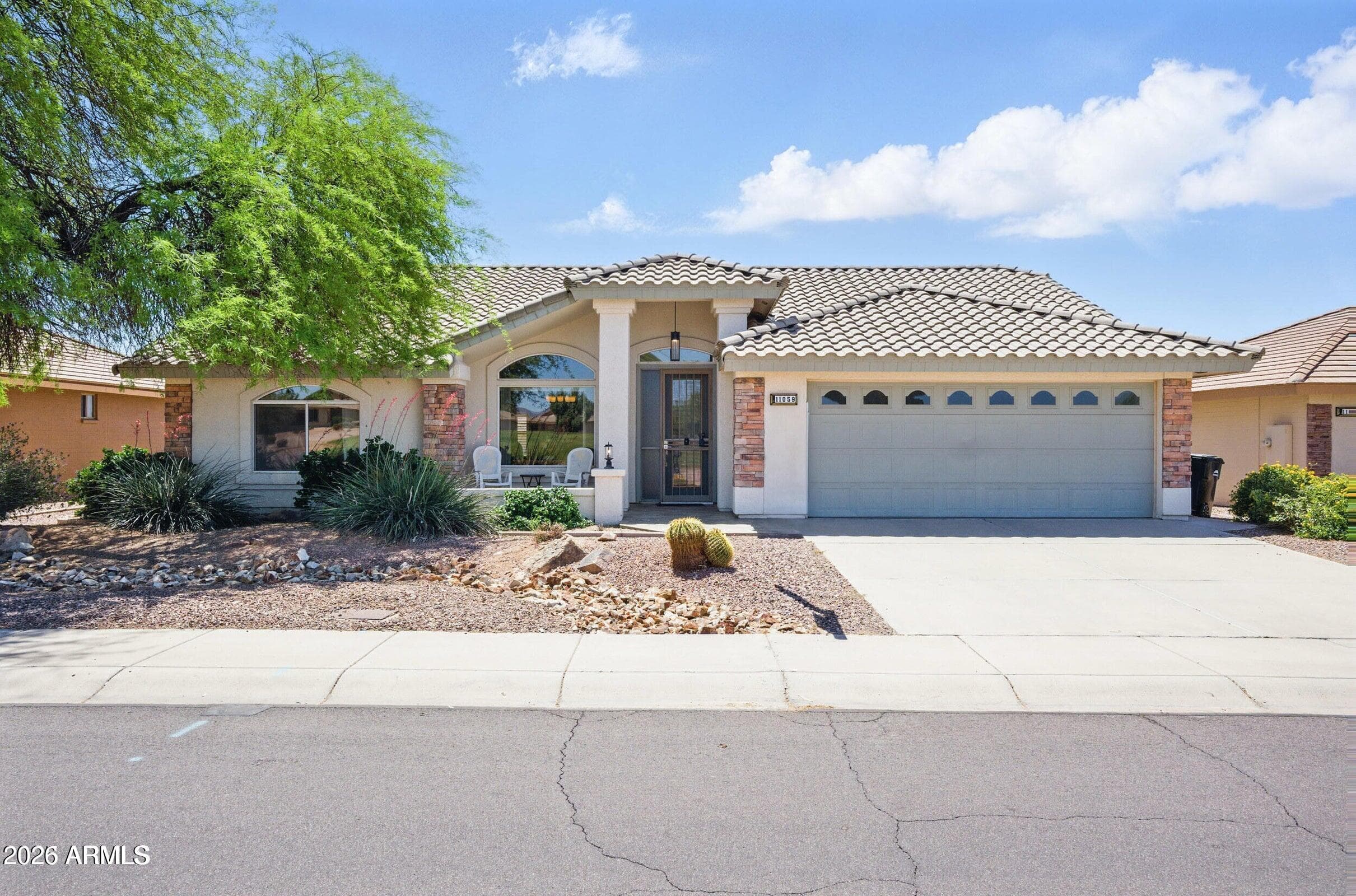 11059 E Kilarea Ave — photo 1