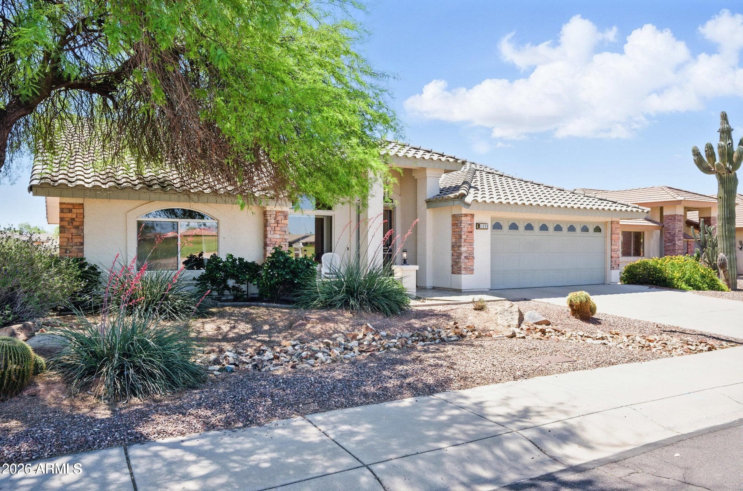 11059 E Kilarea Ave — photo 2