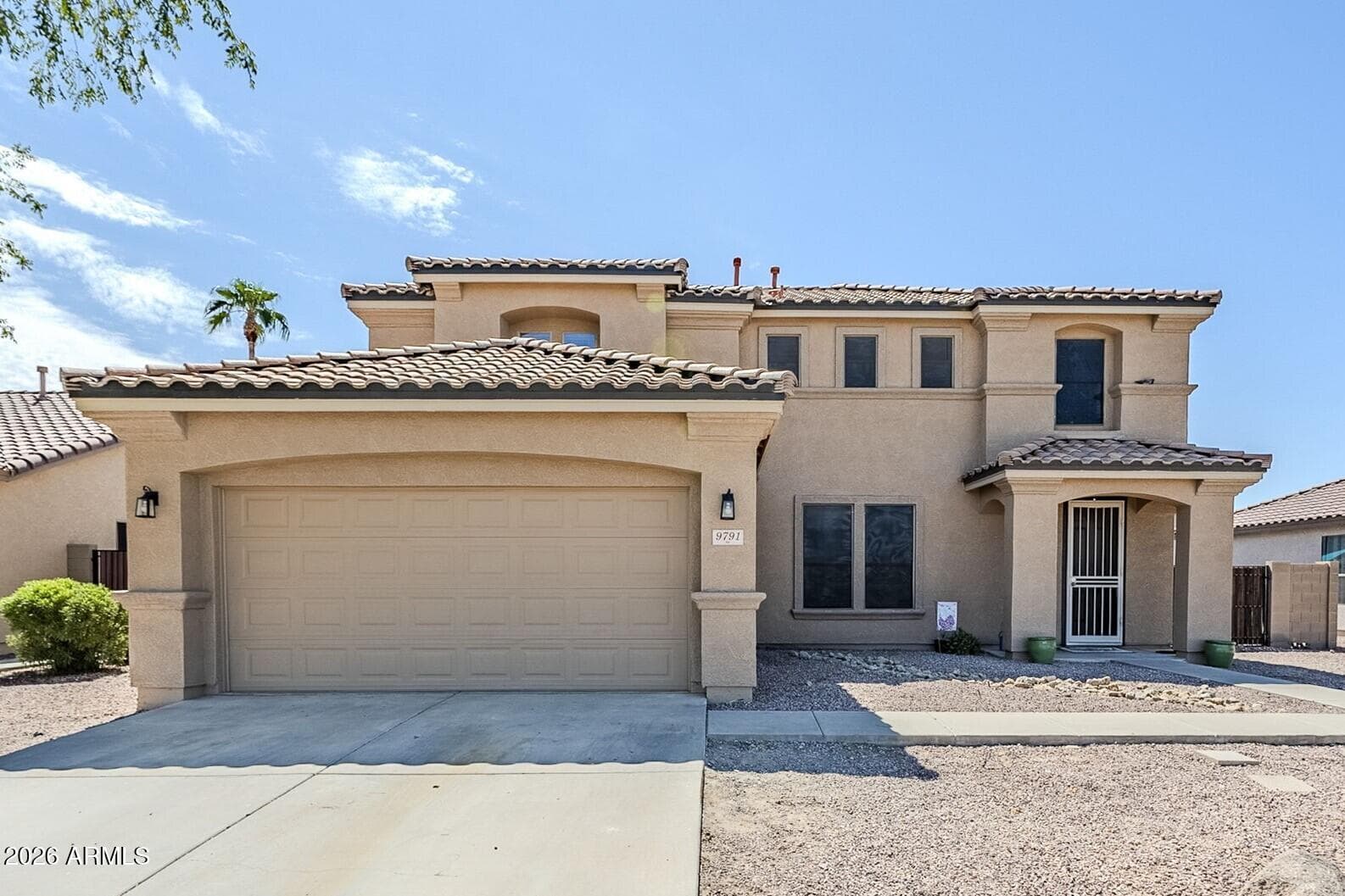 9791 W Butler Dr — photo 1