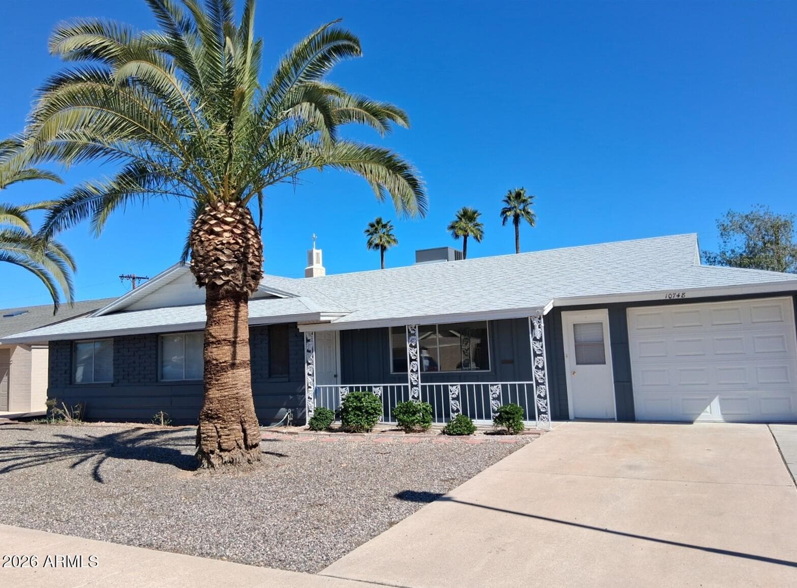 10748 W Hope Dr — photo 1
