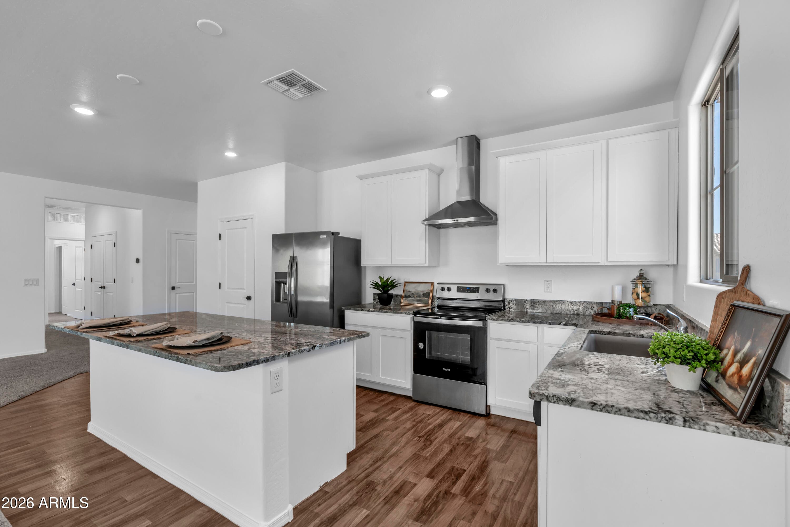 11442 W La Reata Ave — photo 1