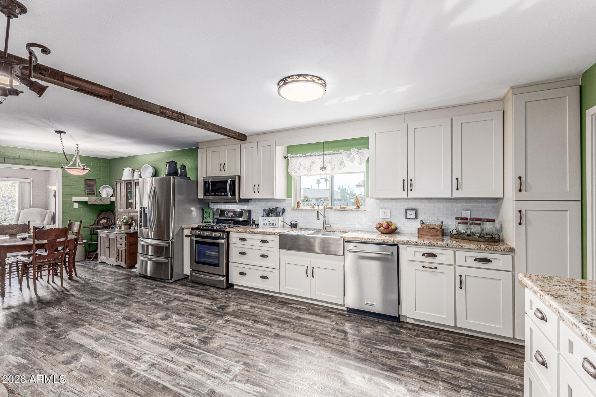 10235 W Clair Dr — photo 2
