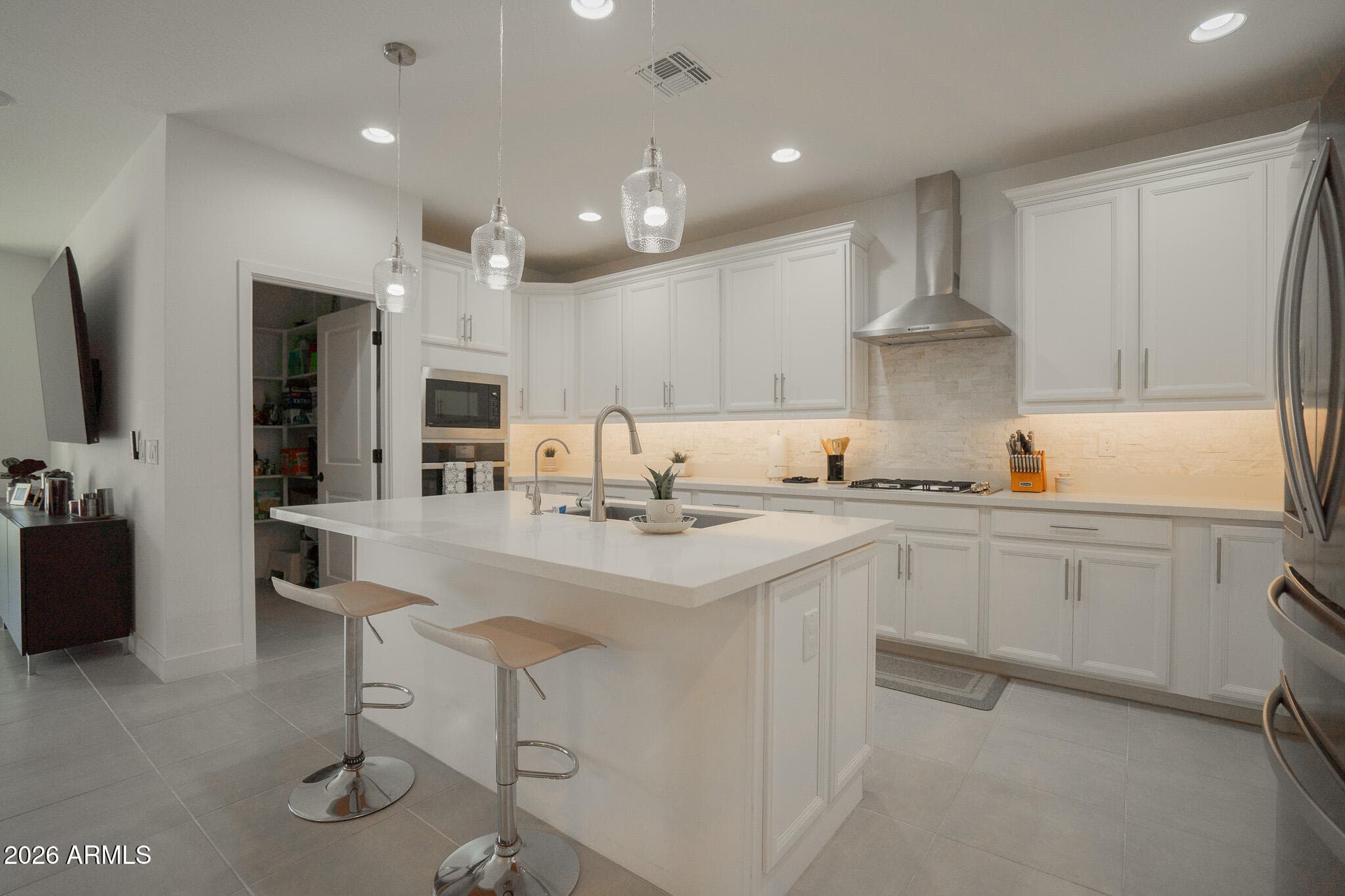 12125 W Luxton Ln — photo 2