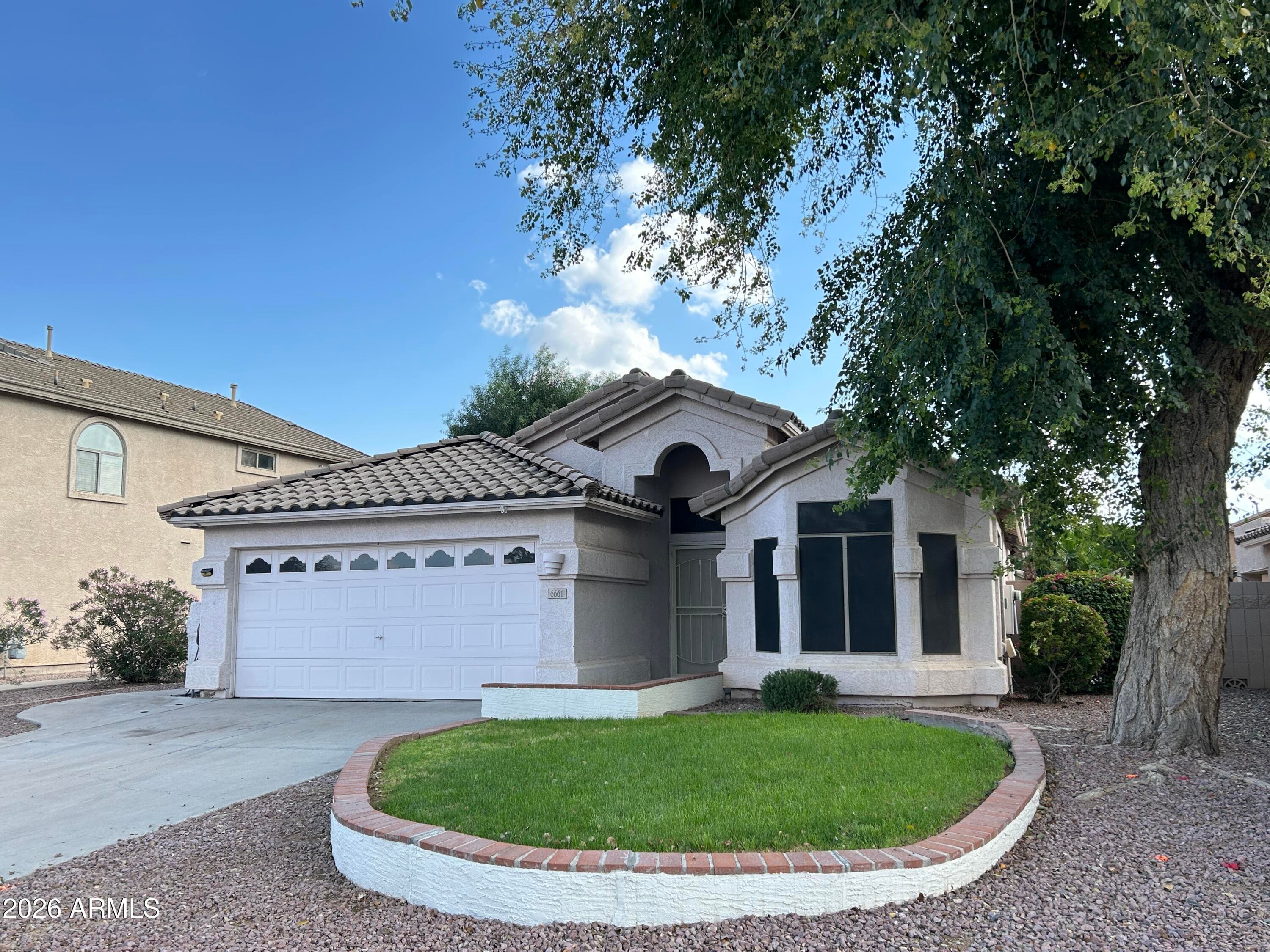 6661 W Aurora Dr — photo 1