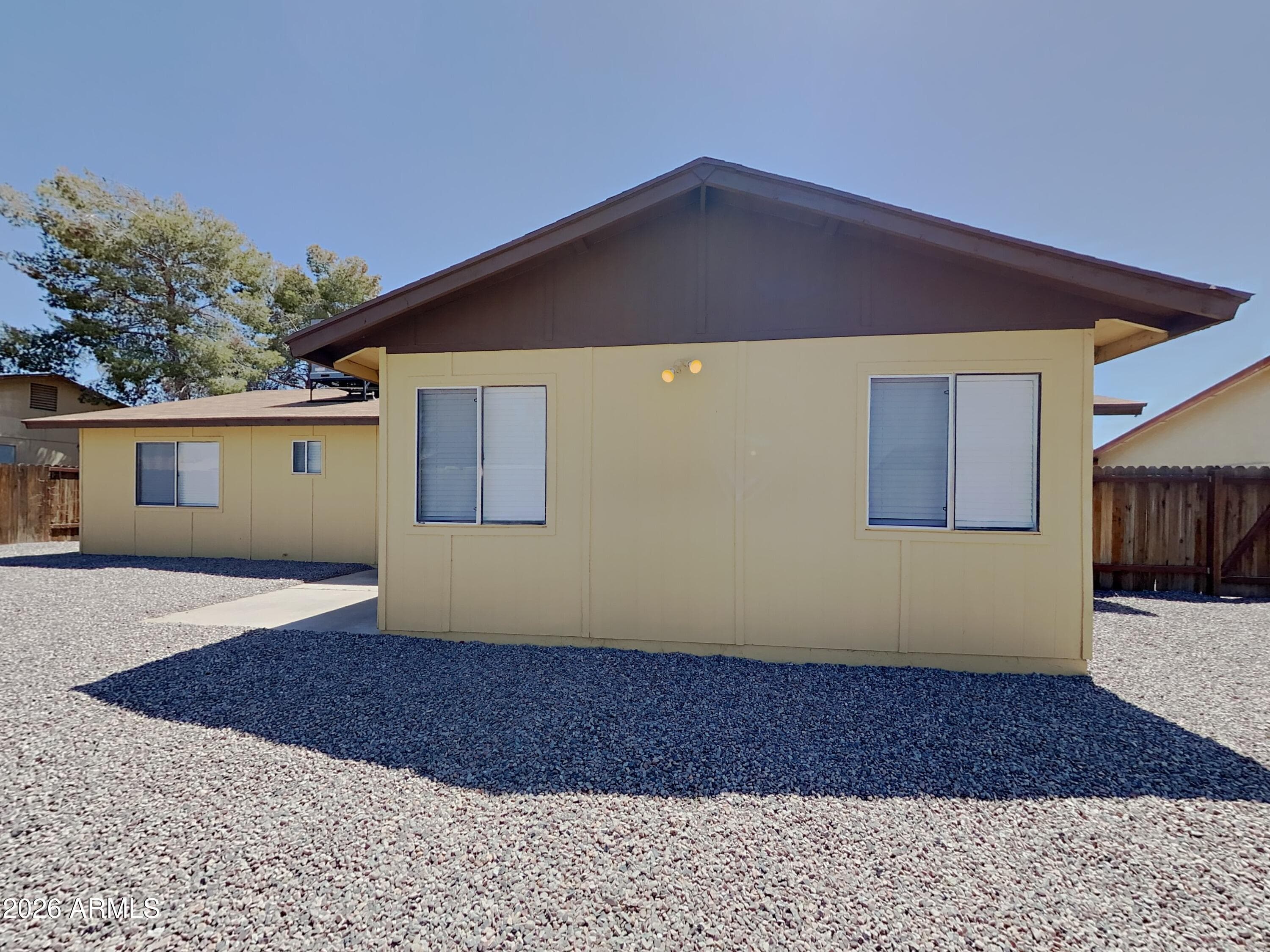 7034 W Purdue Ave — photo 2