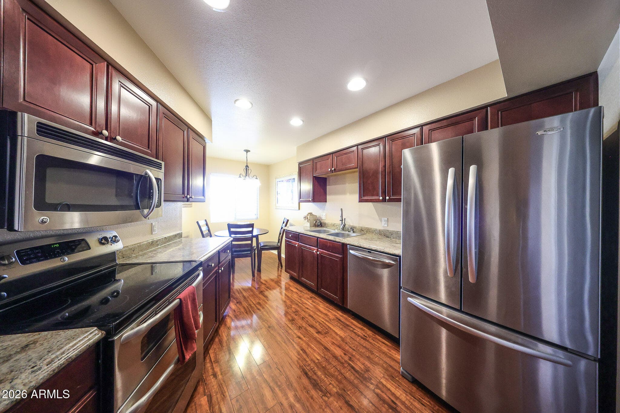 11062 W Coggins Dr — photo 2