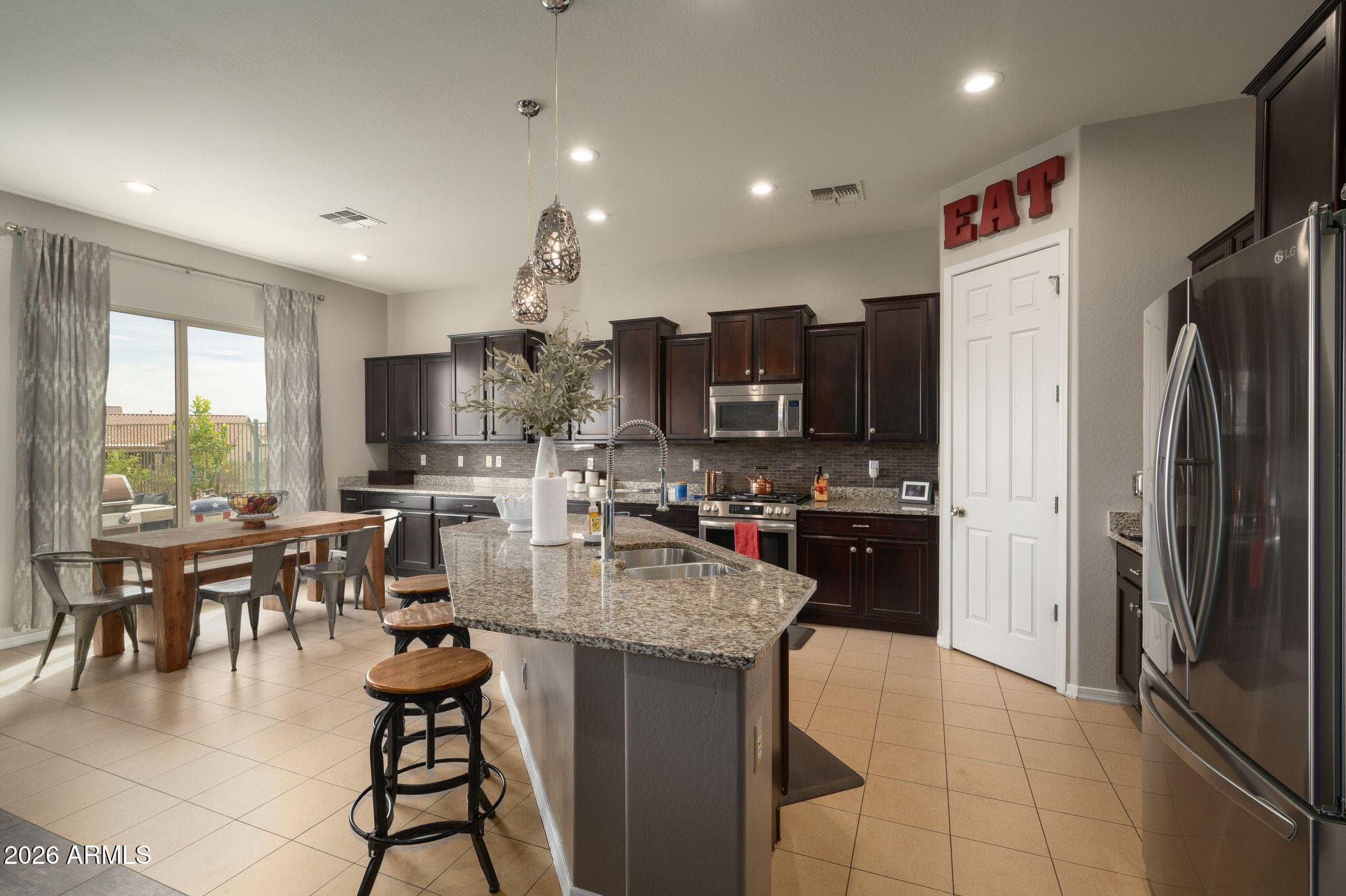 5913 E Bramble Berry Ln — photo 2