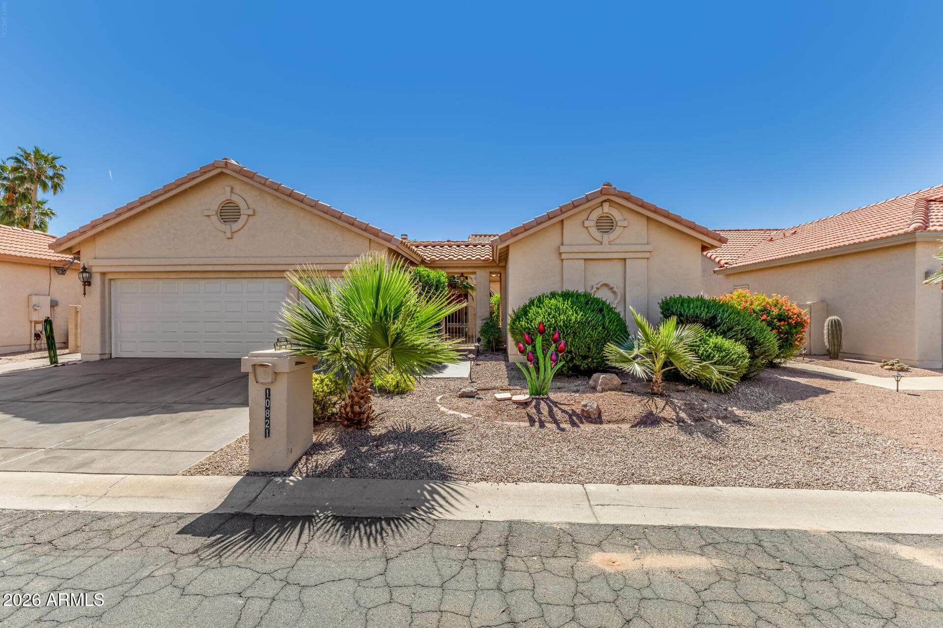 10821 E Silvertree Dr — photo 1