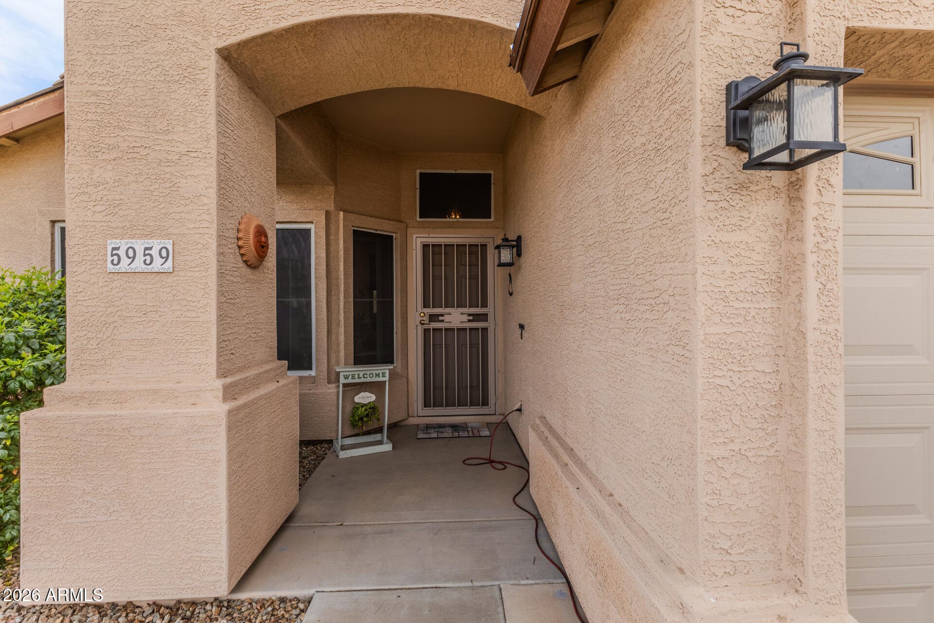 5959 W Bluefield Ave — photo 2