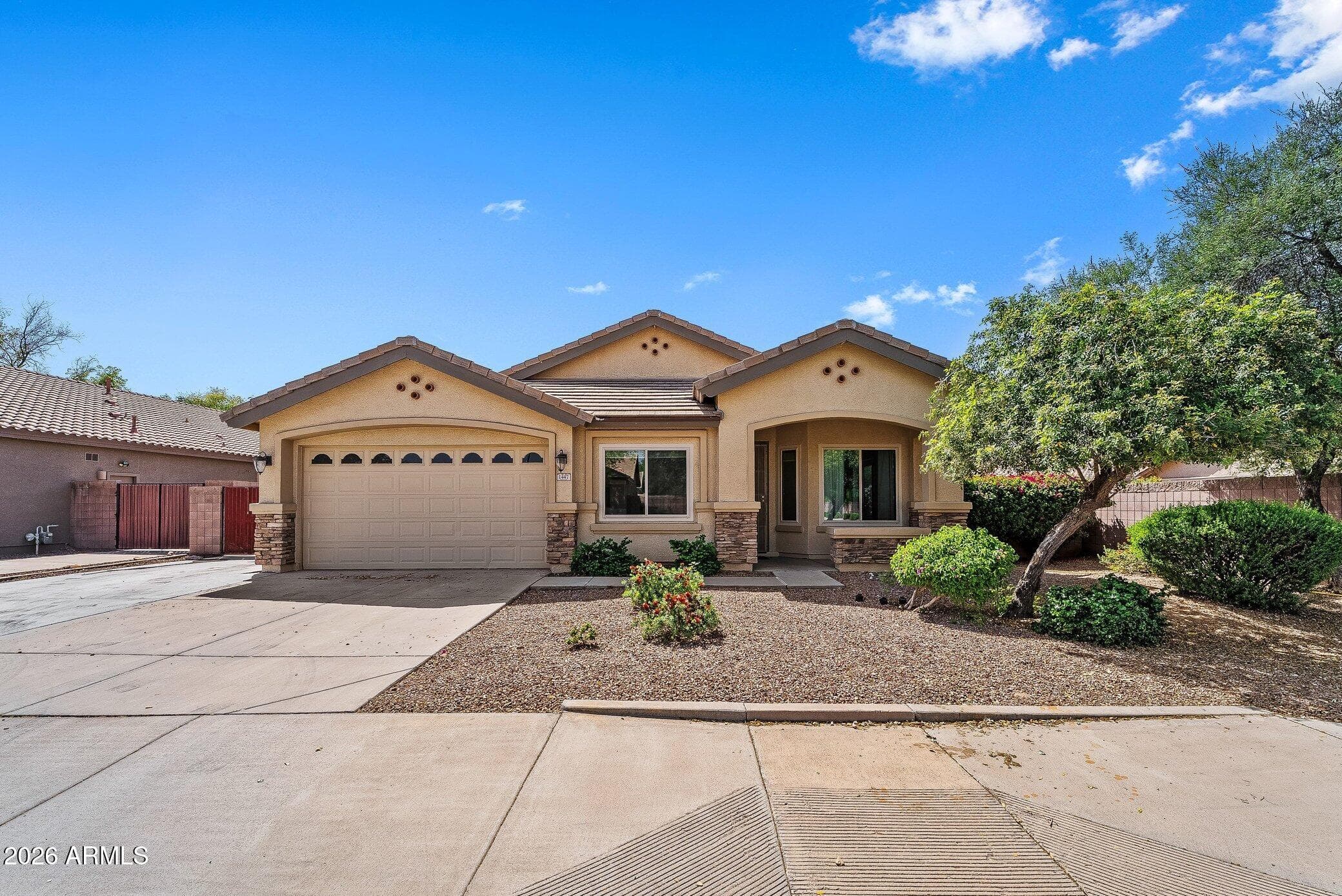 1447 E Carob Pl — photo 1