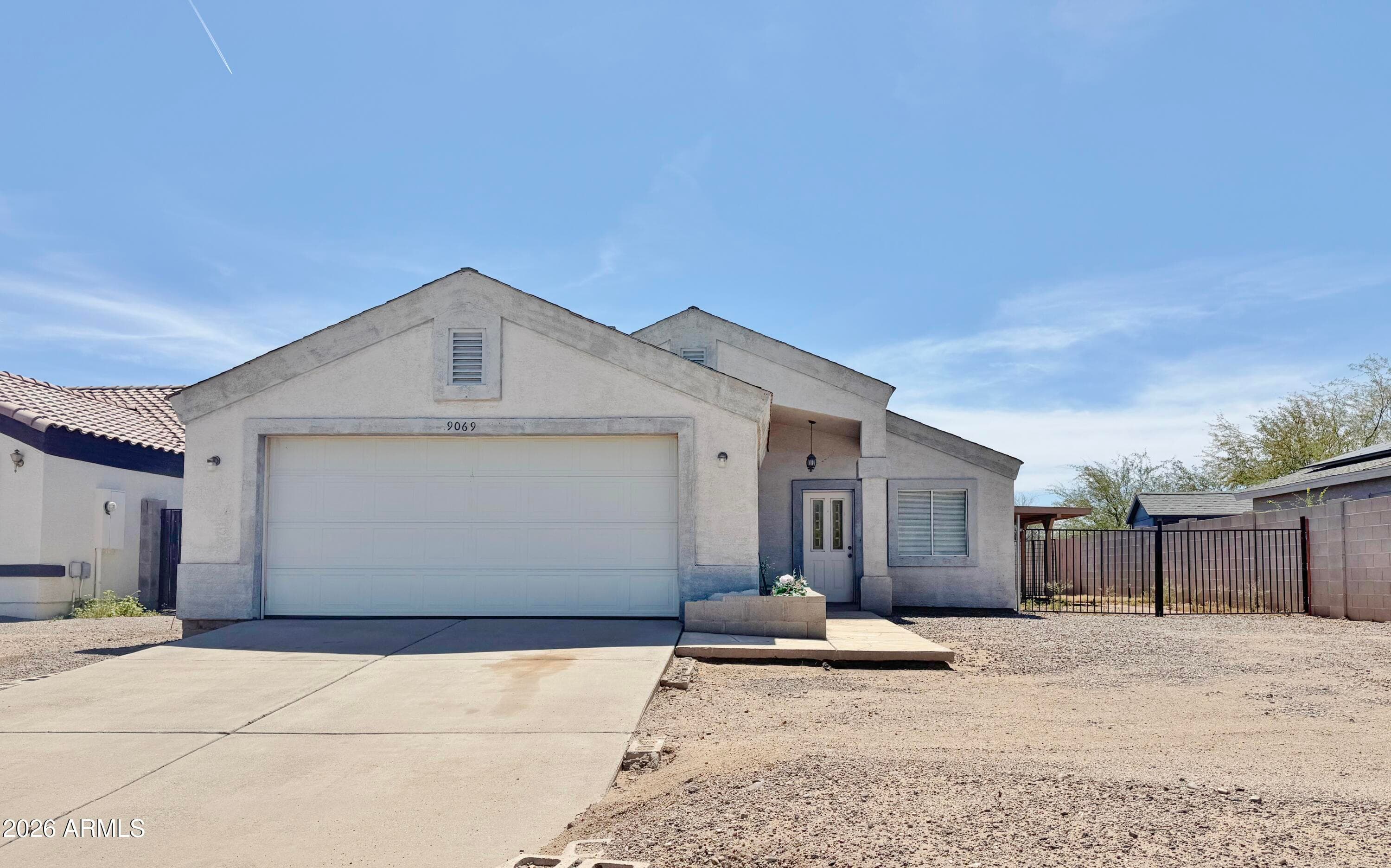 9069 W Oneida Dr — photo 1