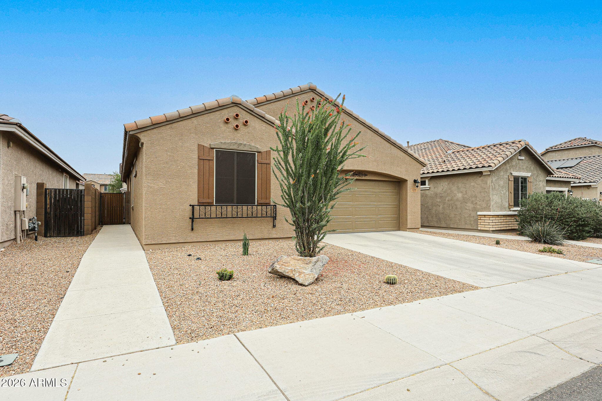 12119 W Rowel Rd — photo 1