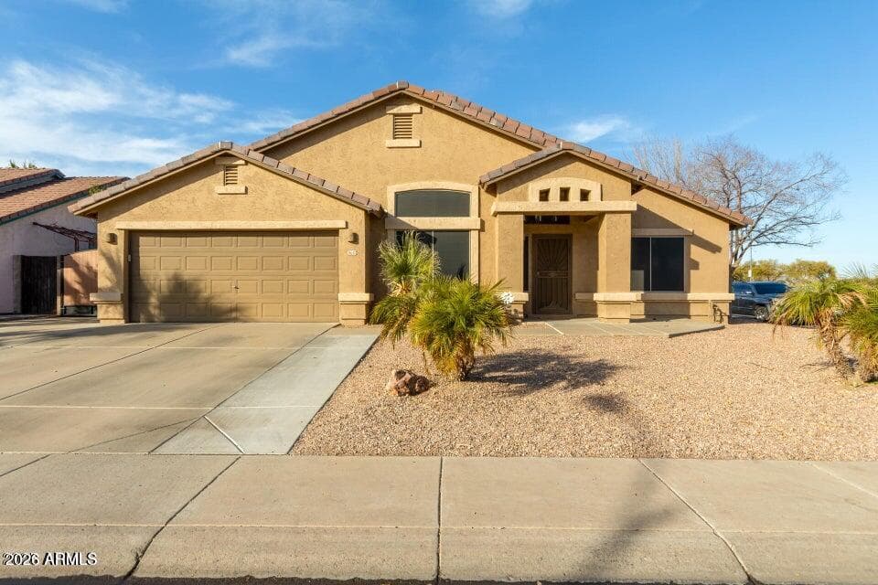 8642 W Harmony Ln — photo 1