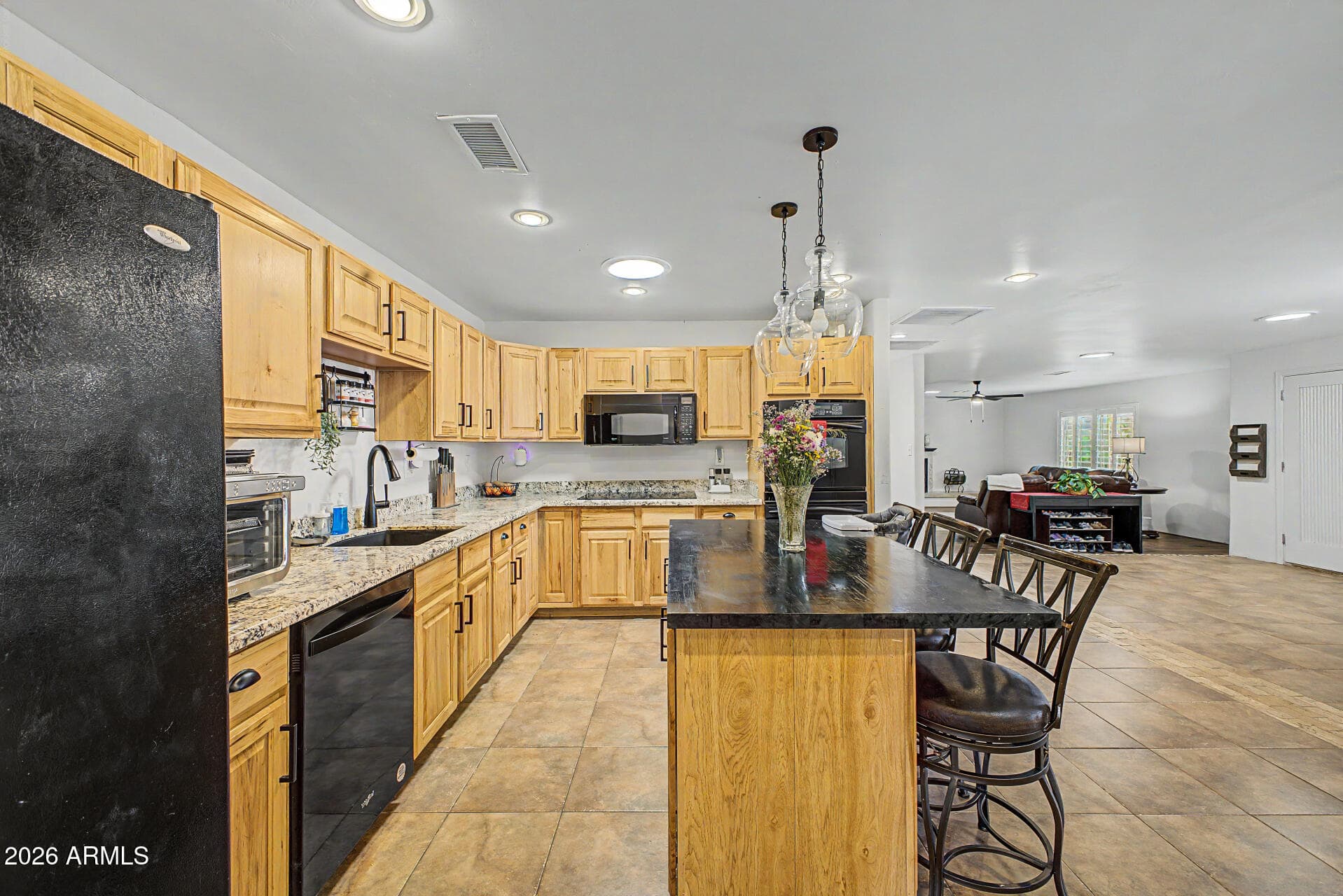 12002 S Mandan St — photo 2