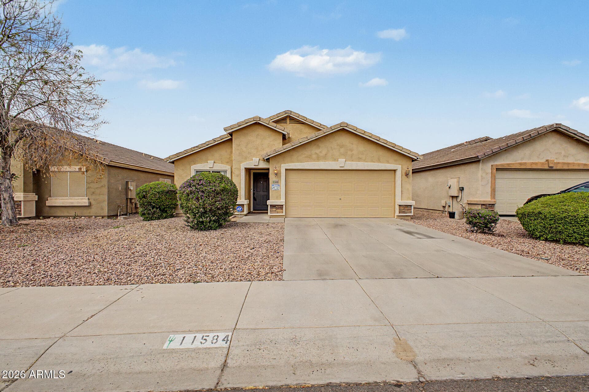 11584 W Oglesby Ave — photo 1