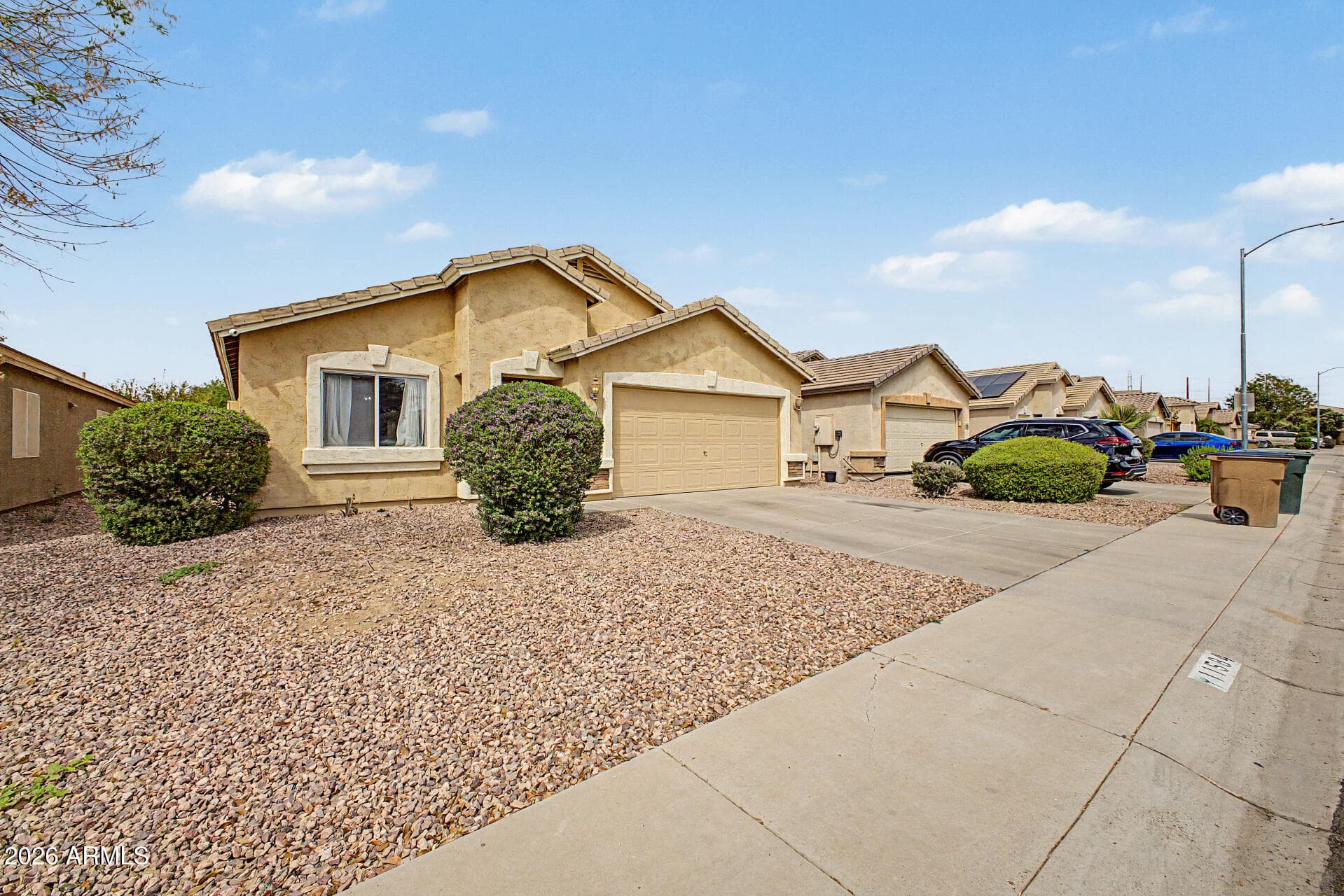 11584 W Oglesby Ave — photo 2