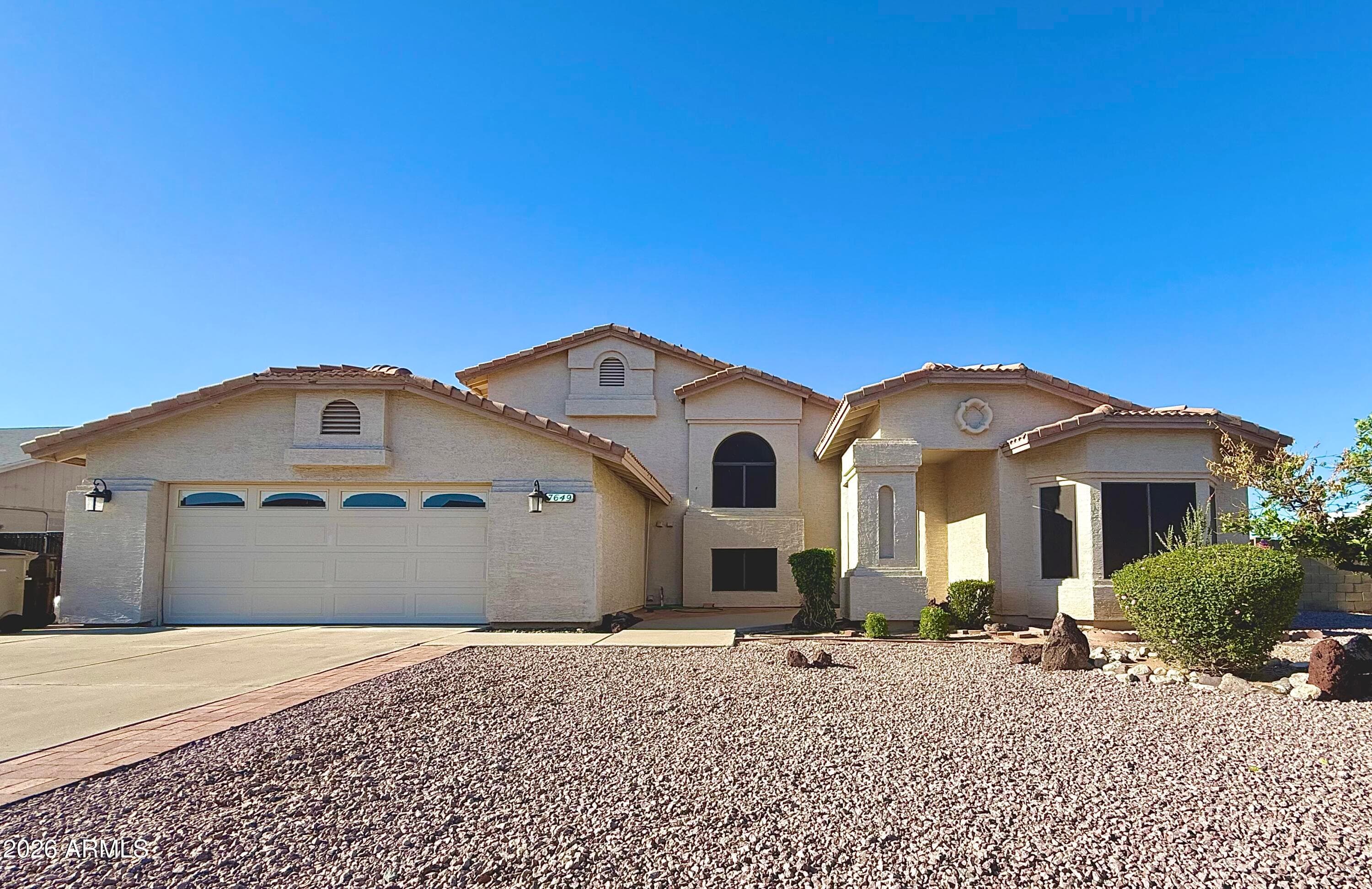 7649 W Aster Dr — photo 1