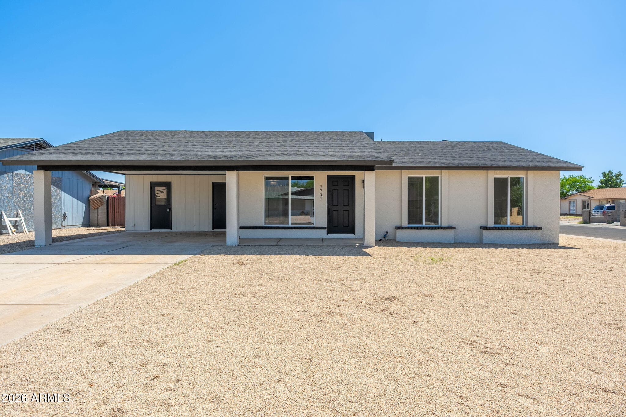 7731 W Mulberry Dr — photo 1