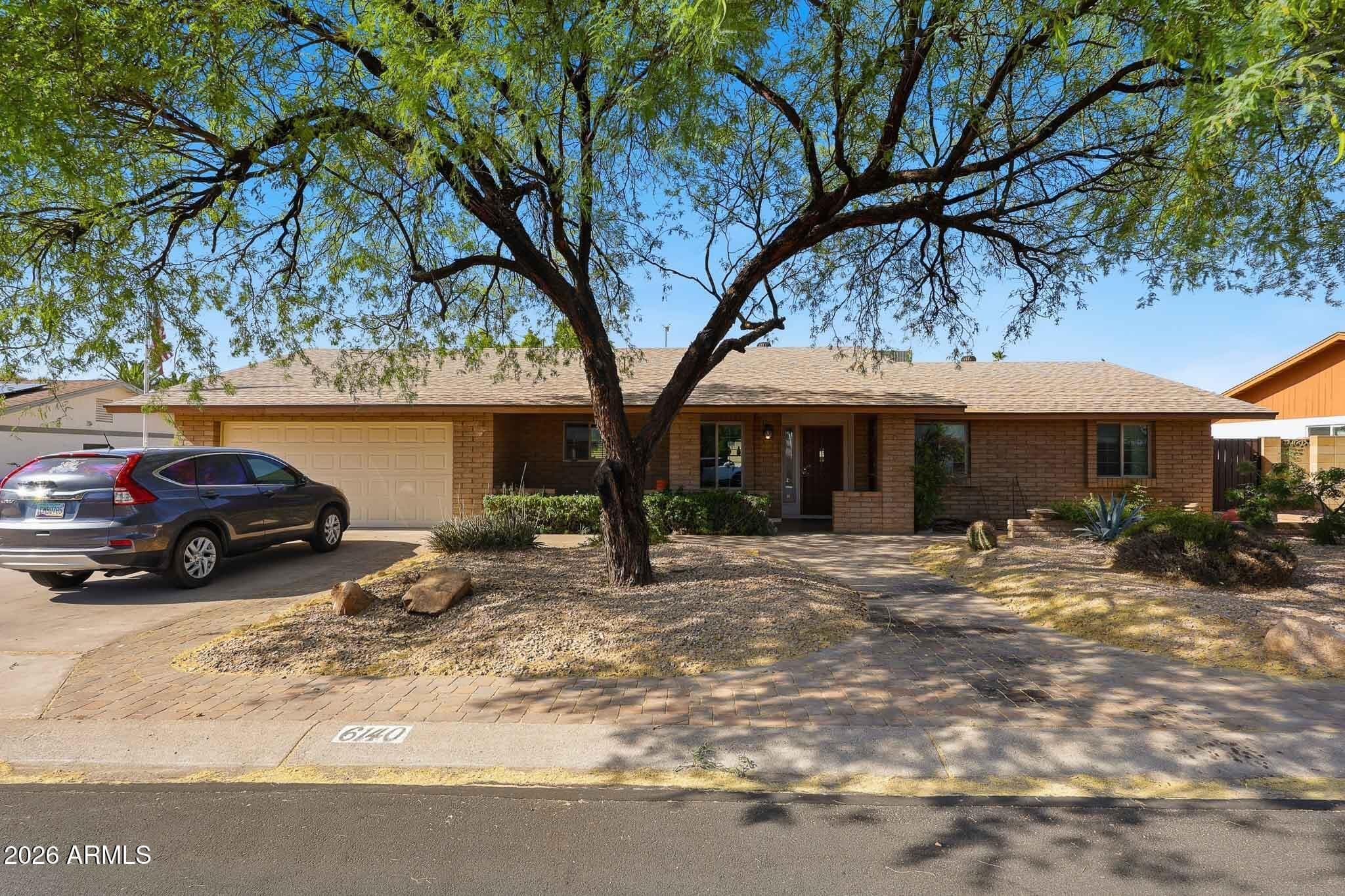 6140 E Hobart St — photo 1