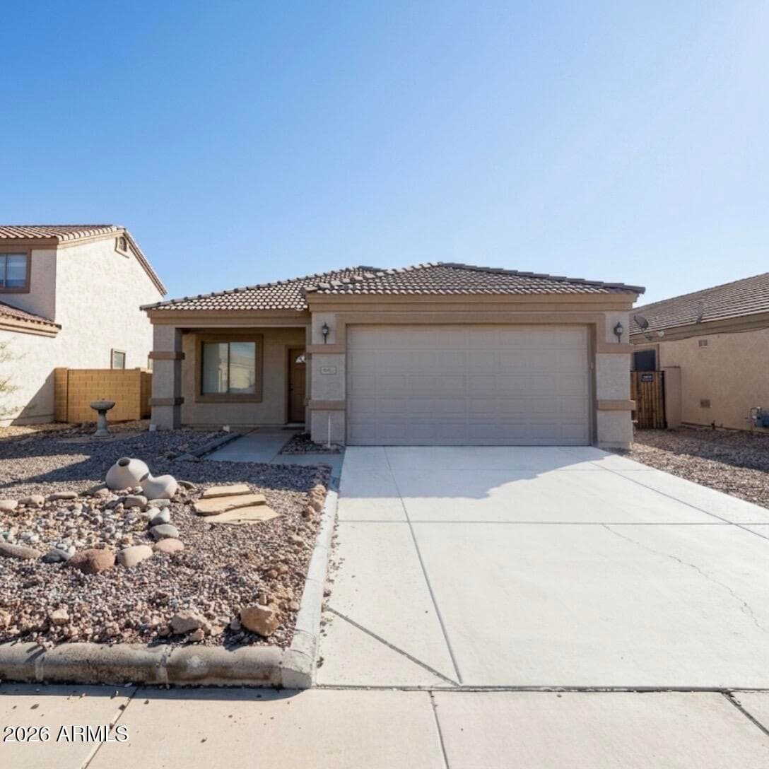 7211 S 56th Dr — photo 1