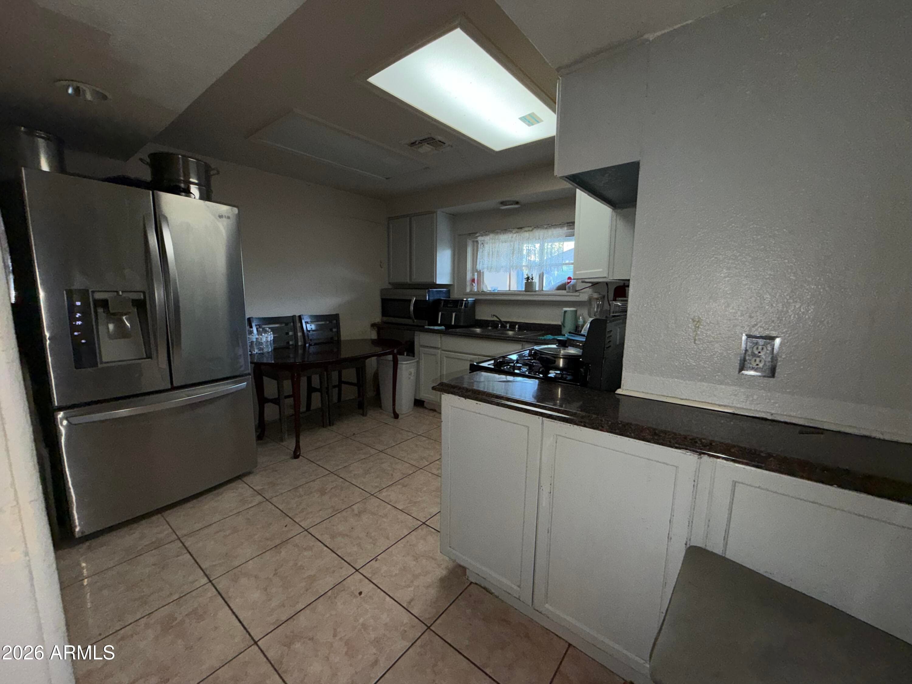 6019 W Orangewood Ave — photo 2
