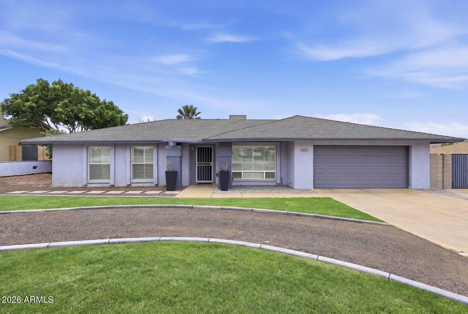 1037 E Acoma Dr — photo 1