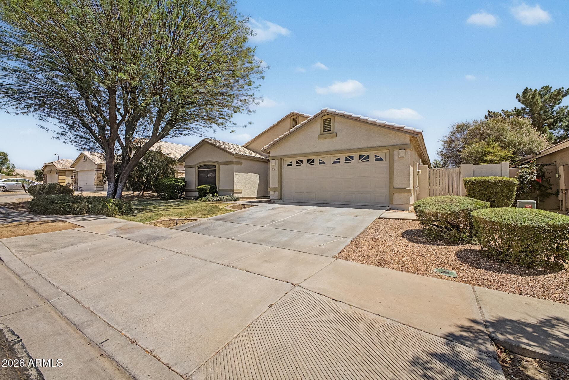 5253 W Frier Dr — photo 2