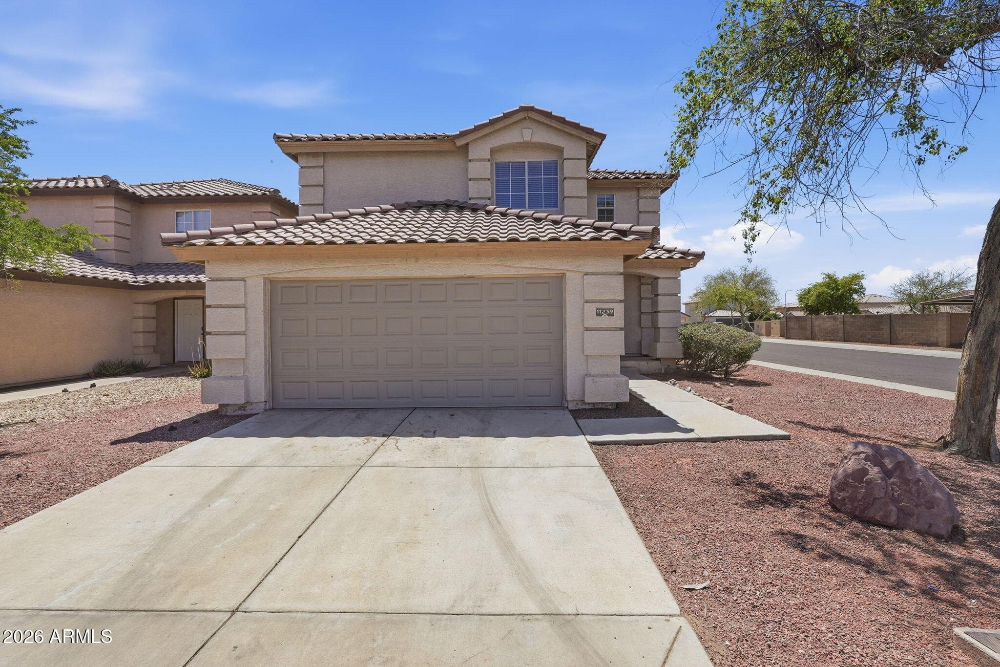 11239 W Roma Ave — photo 1