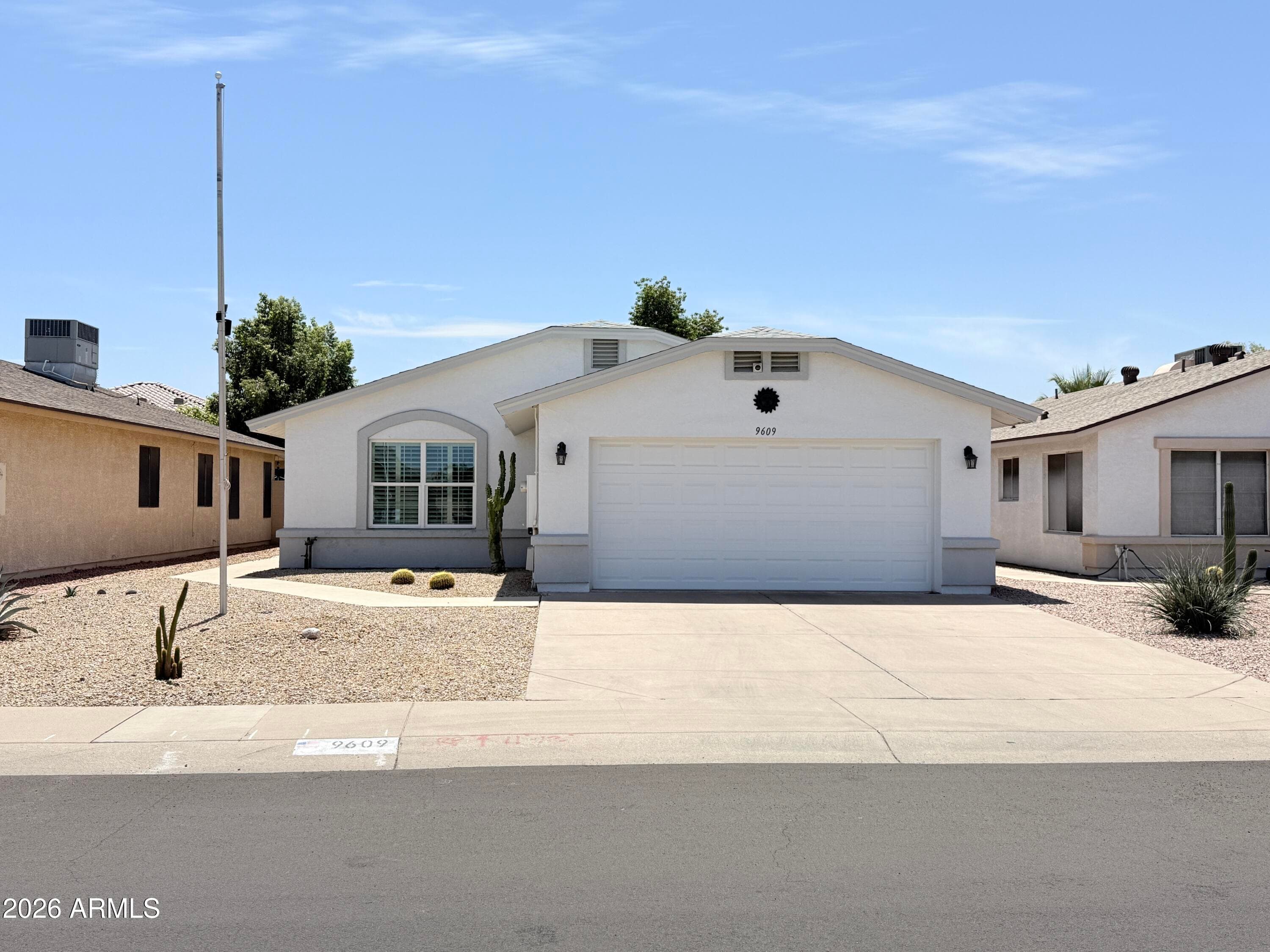9609 W Carol Ave — photo 1