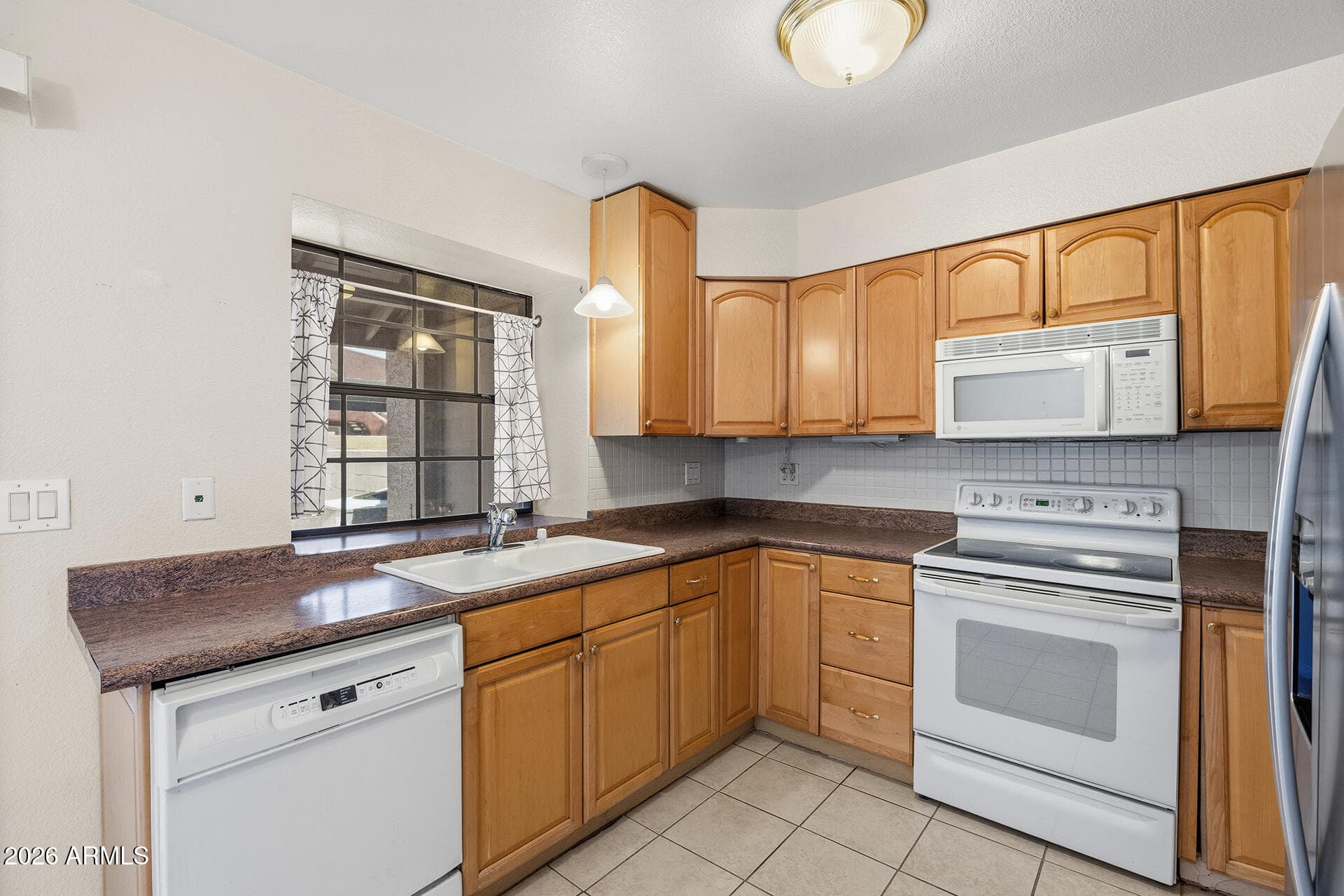5704 E AIRE LIBRE AVE - See more photos