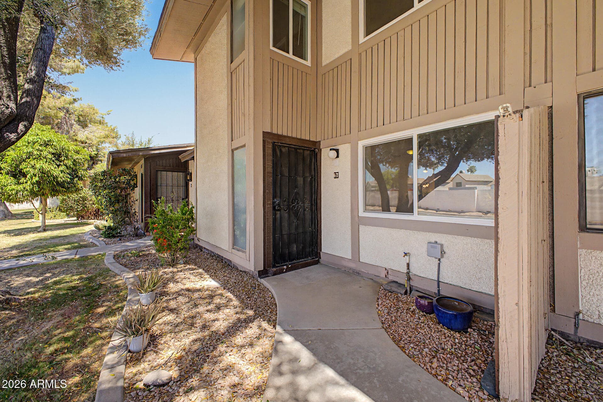 1550 N STAPLEY DR - Photo 2