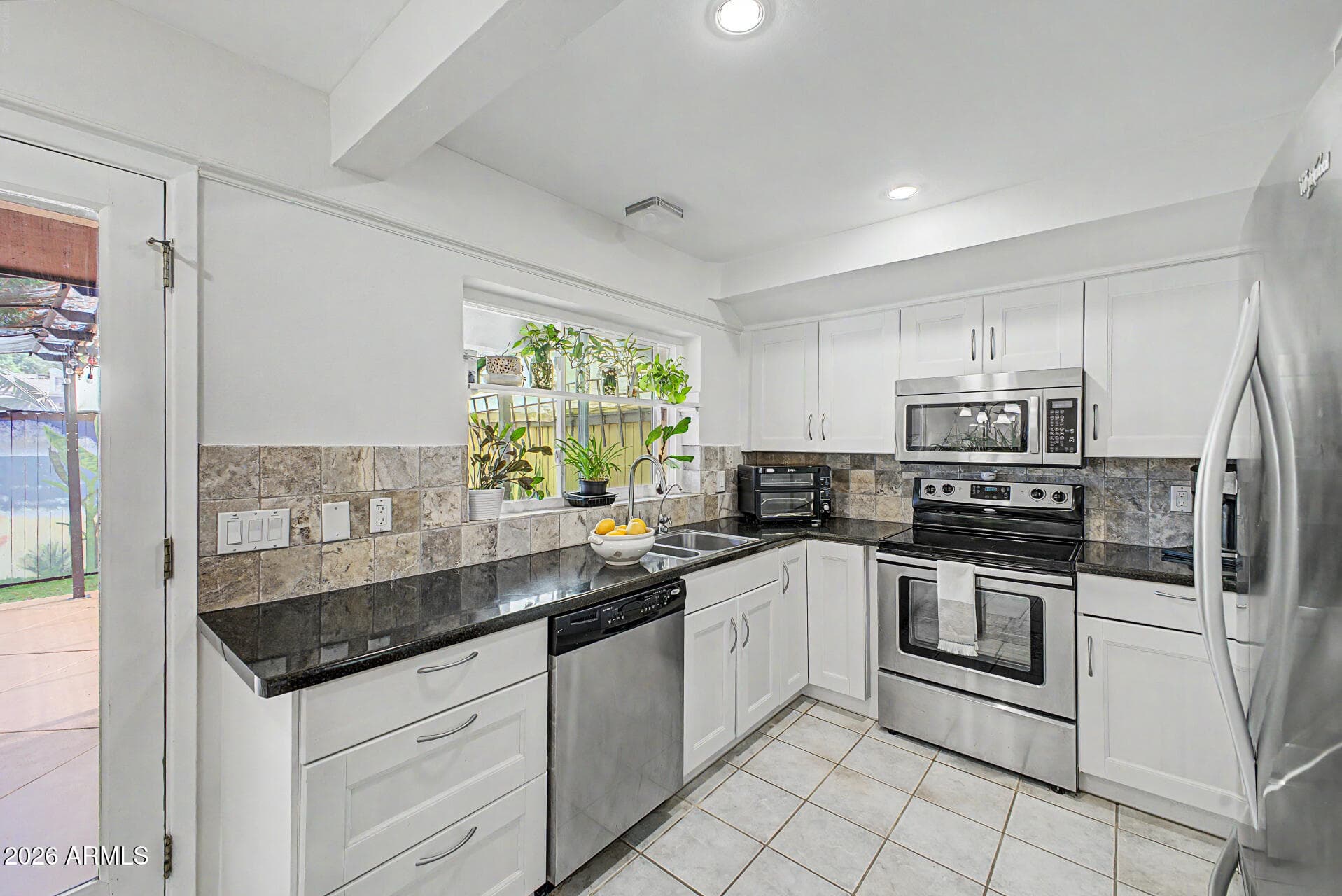 1550 N STAPLEY DR - Photo 1