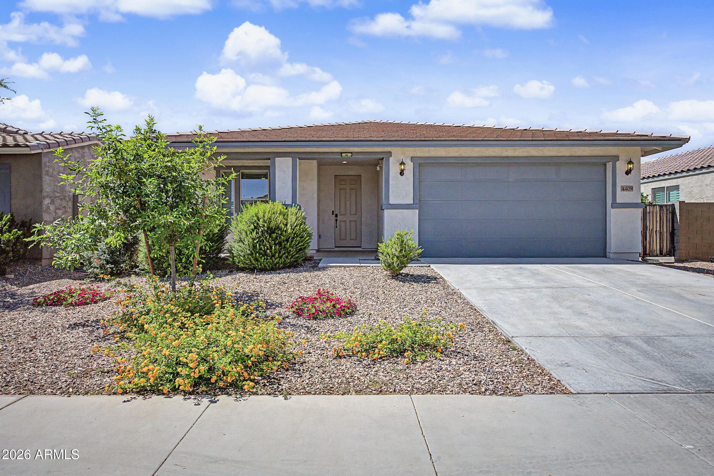 4409 W Vervain Ave — photo 1