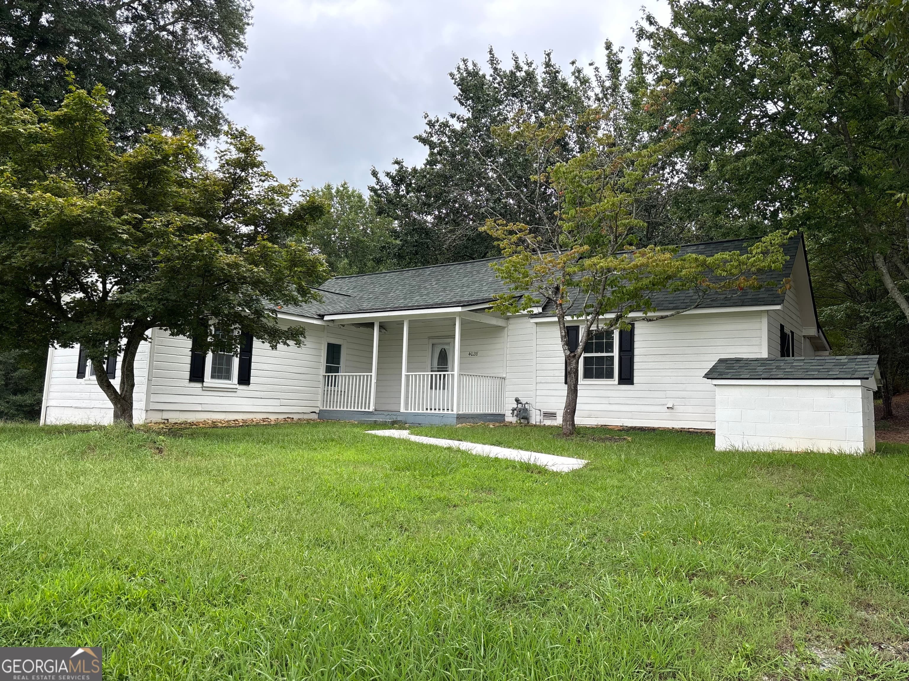 4022 Sutton Rd — photo 1