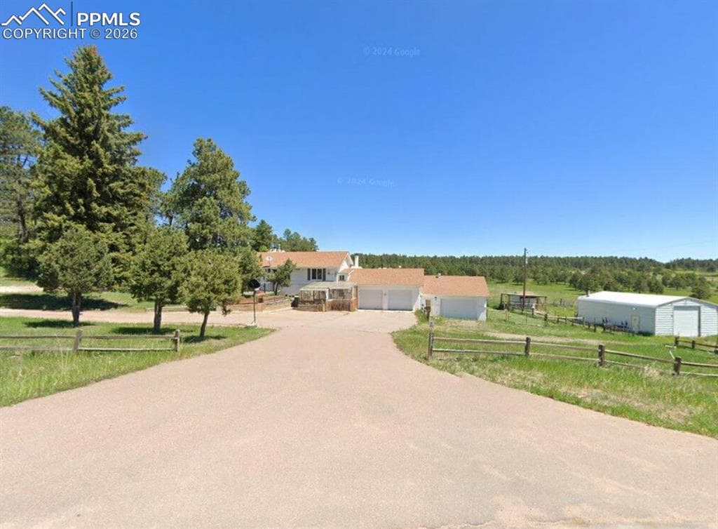 3033 E Palmer Divide Ave — photo 1